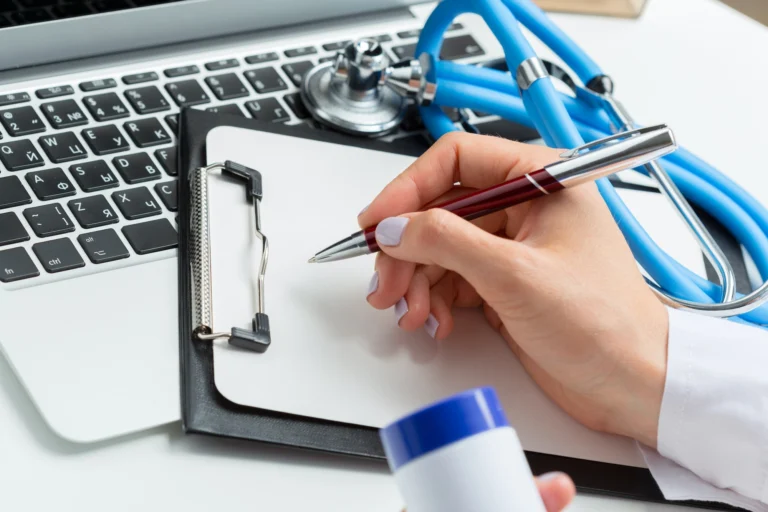 the doctor writes a prescription pil